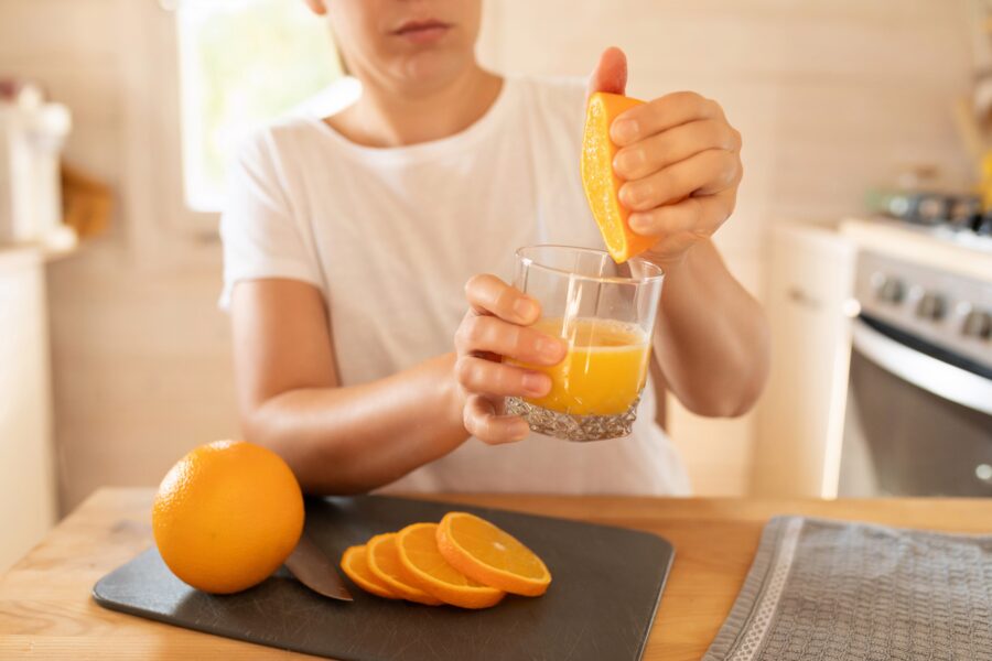 How does orange help the health of men?